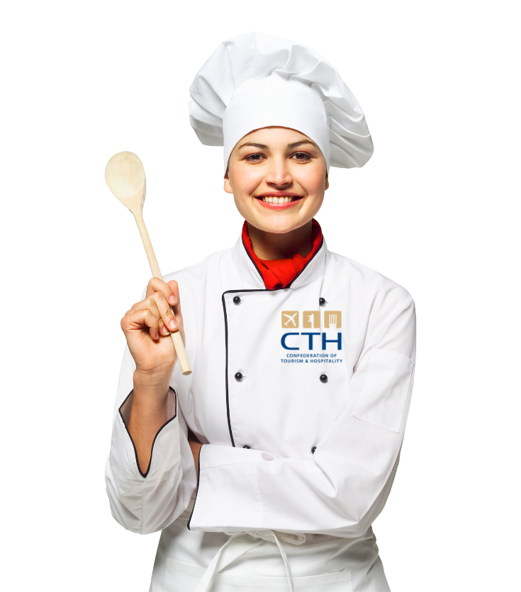 A woman chef hat, holding a wooden spoon.